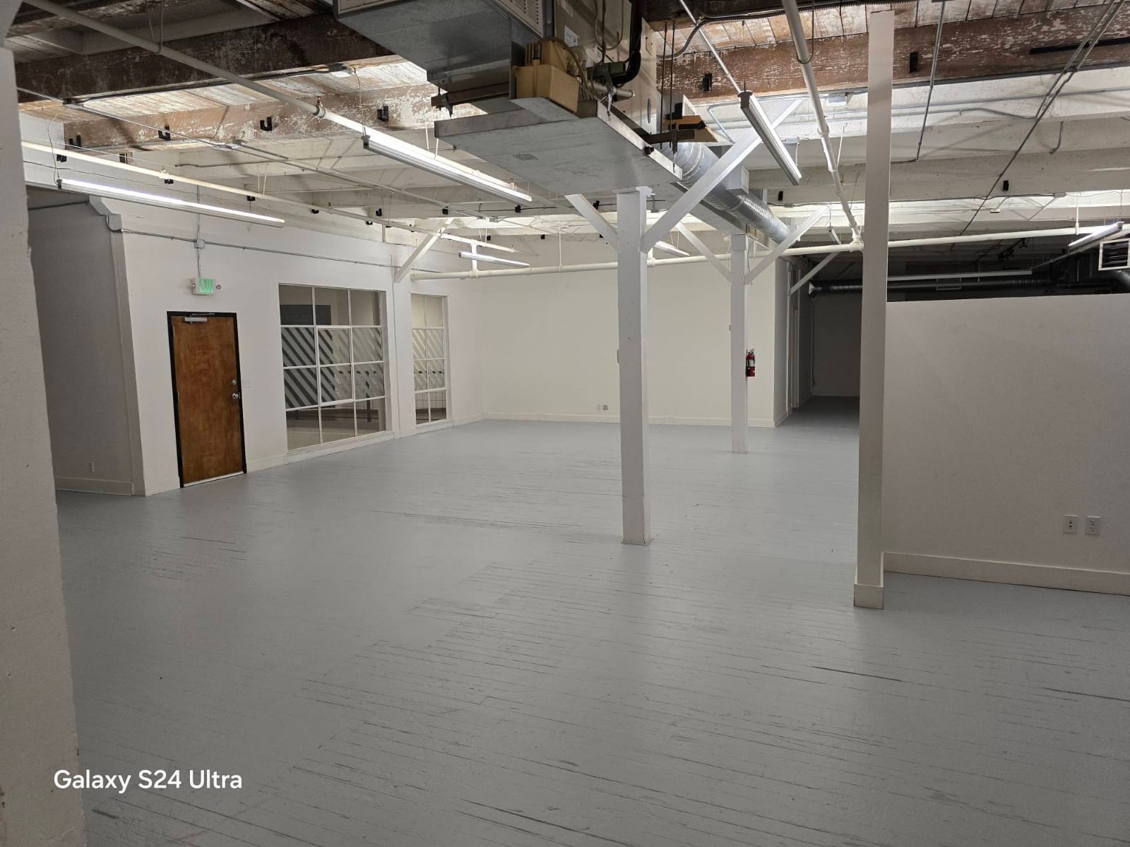 Office painting project with protective coverings in Portland