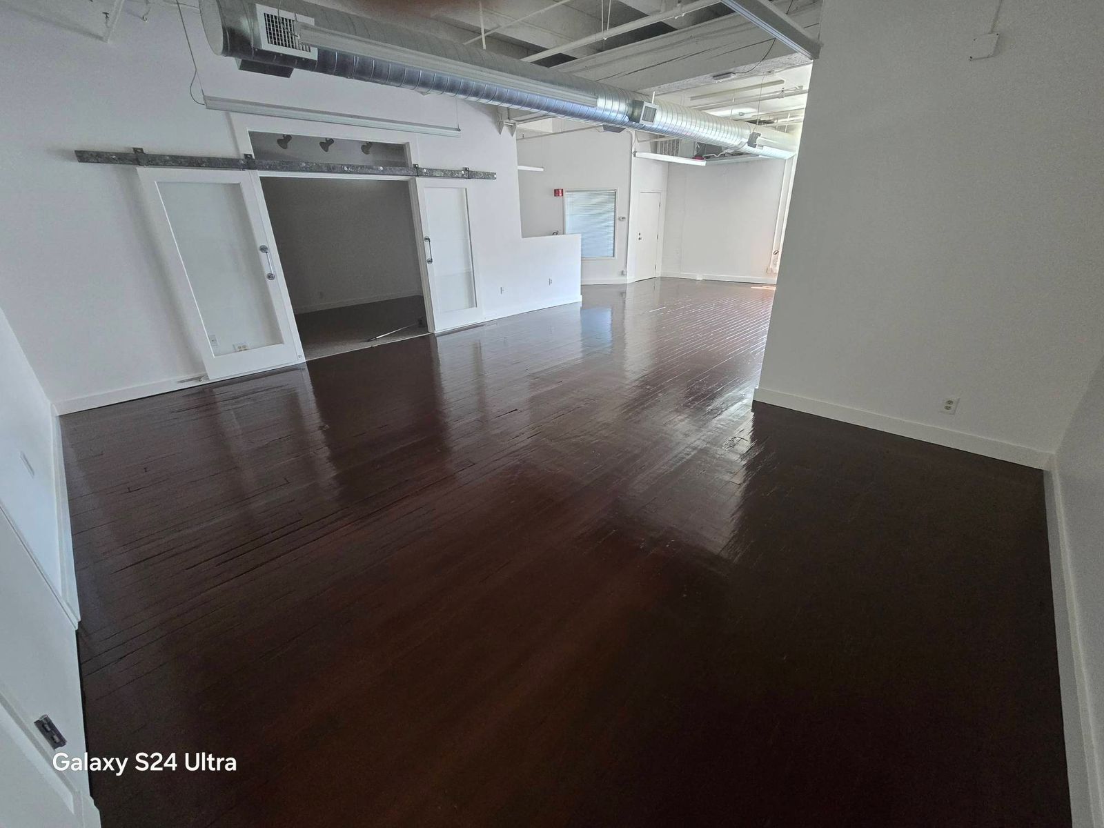 Refinished floors before restoration at Maddox Building, Portland